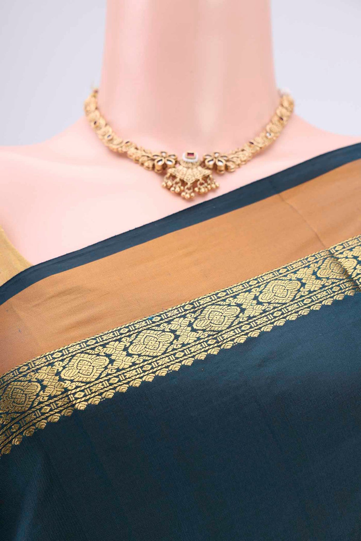 Border image of Bottle Green Blended Bangalore Silk Saree with Zari Butta on the body and Zari Border. 