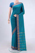 Turquoise Blended Bangalore Silk Saree with Zari Butta on the body and Zari Border.  displayed on a mannequin