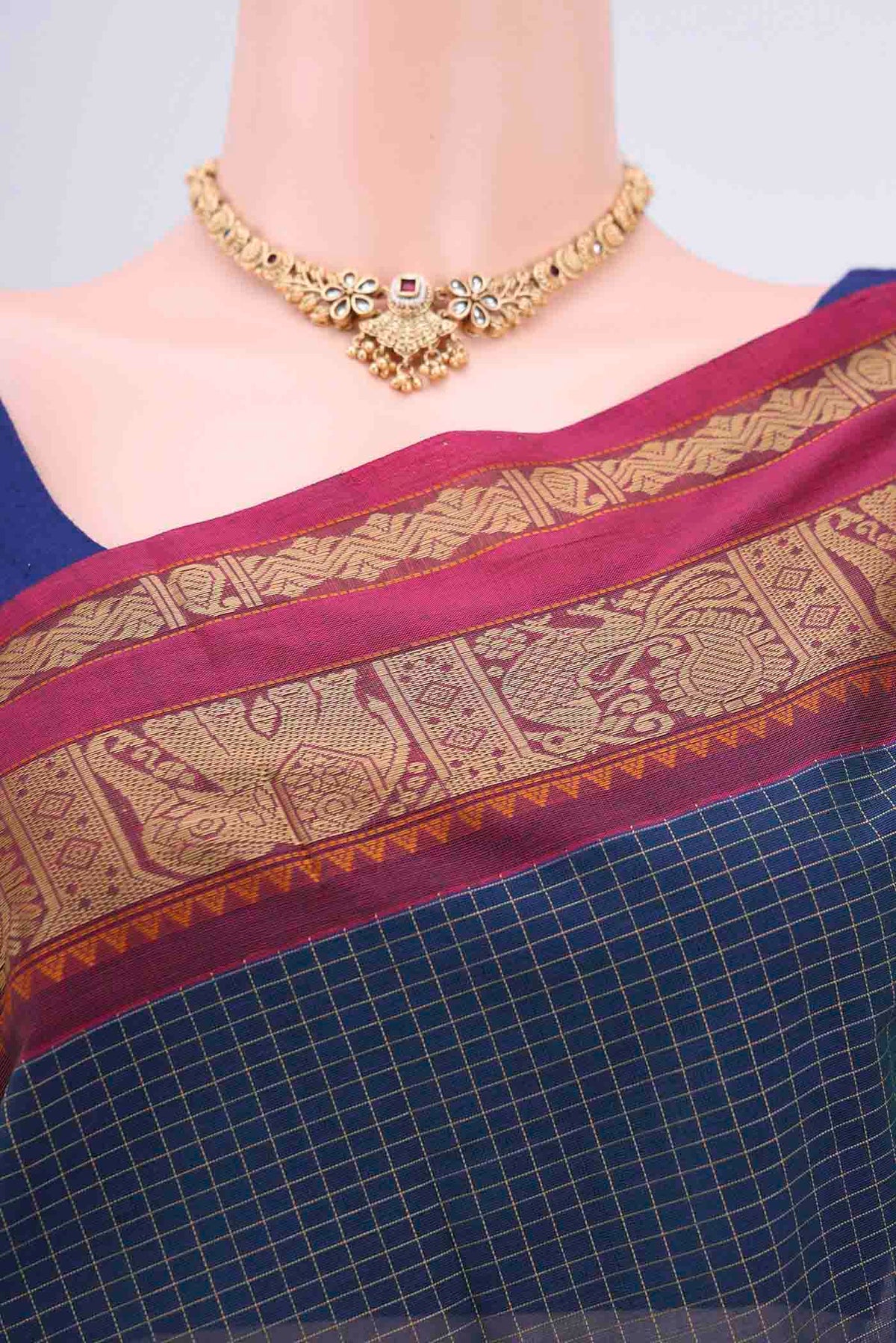 Border image of Blue Coimbatore Cotton Saree with Checked design on the body and Plain Border. 