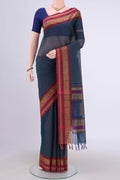 Blue Coimbatore Cotton Saree with Checked design on the body and Plain Border.  displayed on a mannequin
