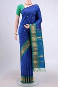 Dark Blue Dual Tone Kanjivaram Silk Saree with Zari Butta on the body and One Side Border.  displayed on a mannequin