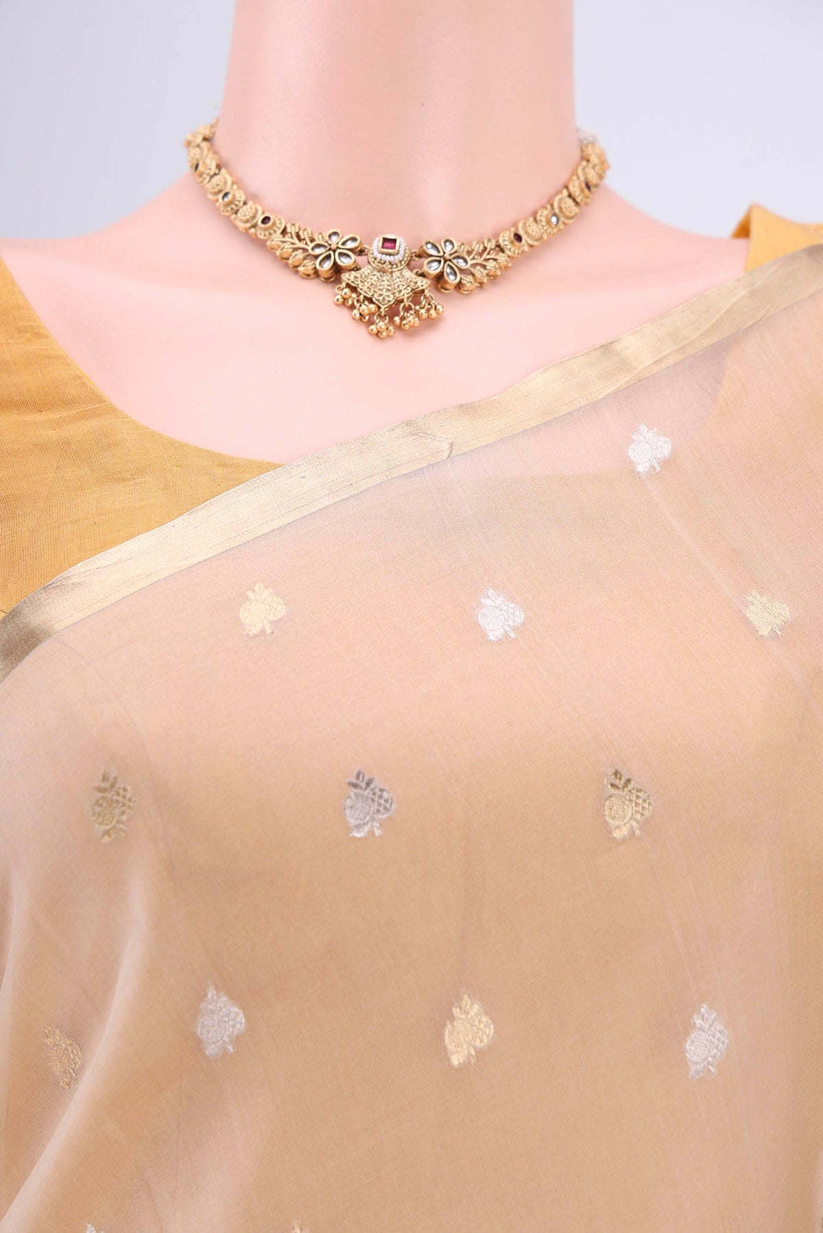 Border image of Beige Banarasi Katan Silk Saree with Zari Butta on the body and Zari Border. 