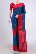 Turquoise Soft Silk Saree with Zari Butta on the body and Zari Border.  displayed on a mannequin