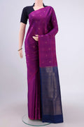 Magenta Soft Silk Saree with Zari Butta on the body and Zari Border.  displayed on a mannequin