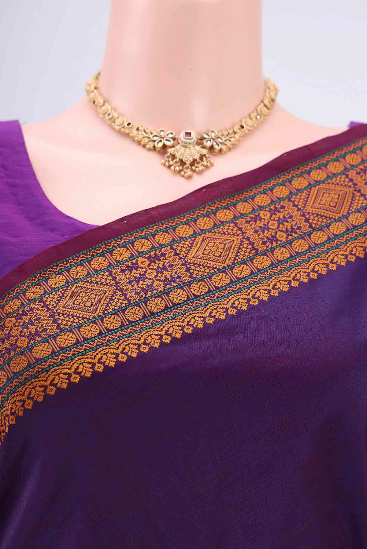 Border image of Purple Blended Poly Cotton Saree with Thread Butta on the body and Thread Border. 
