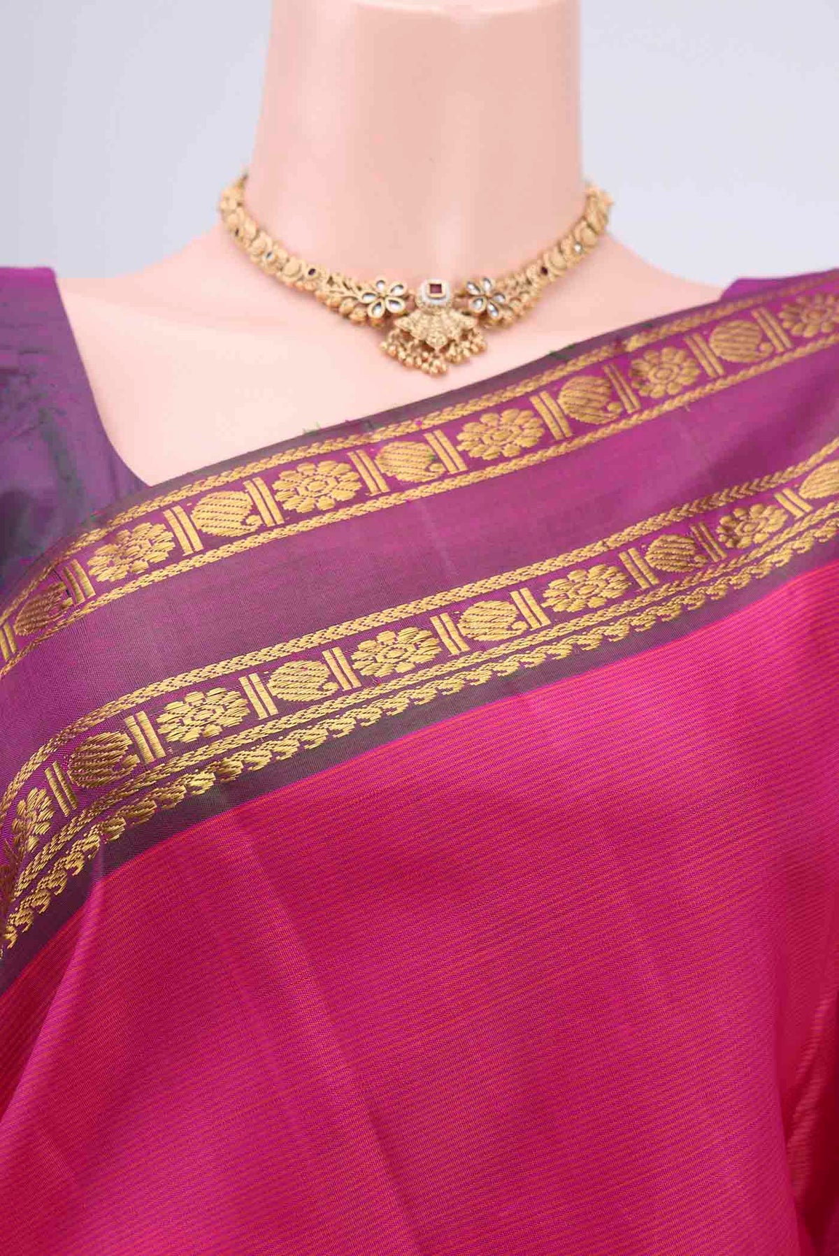 Border image of Pink Kanchipuram Silk Saree with Stripes on the body and Zari Border. 