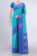 Turquoise Kanchipuram Silk Saree with Plain Body and Zari Border.  displayed on a mannequin