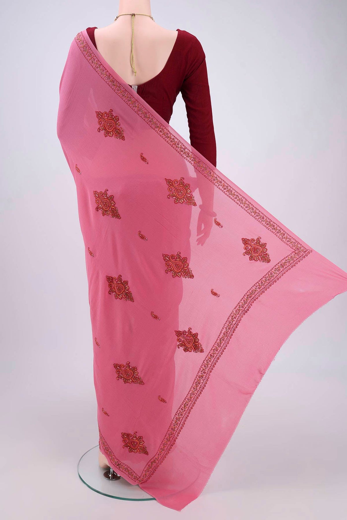 Flat view of Pink Kashmiri Saree with Plain Body and Thread Border. 