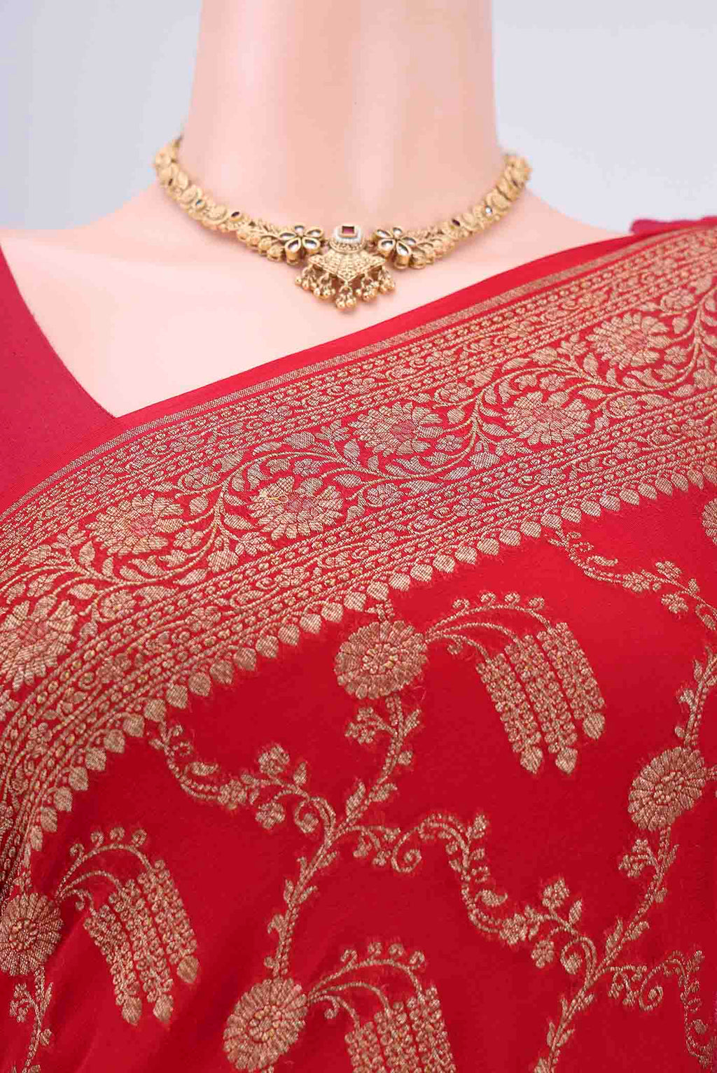 Border image of Red Banarasi Georgette Saree with Zari Brocade on the body and Zari Border. 