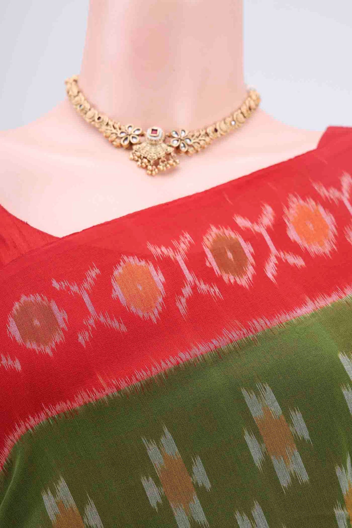 Border image of Light Green Pochampally Cotton Saree with Ikat design on the body and Ikat Border. 