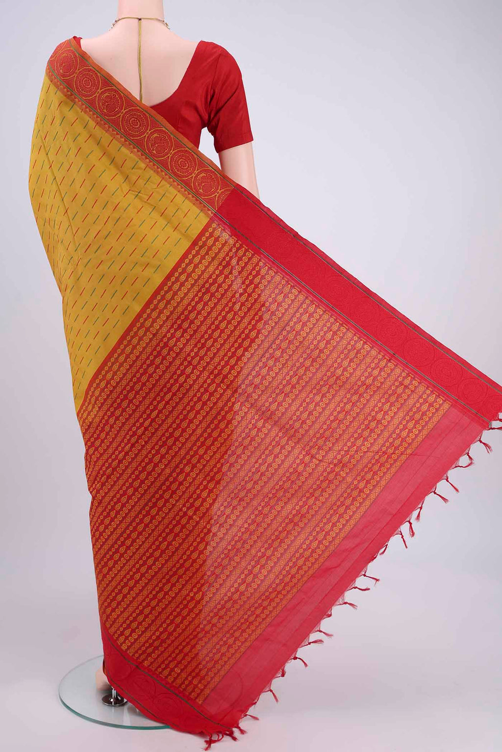 Flat view of Mustard Blended Poly Cotton Saree with Thread Butta on the body and Thread Border. 