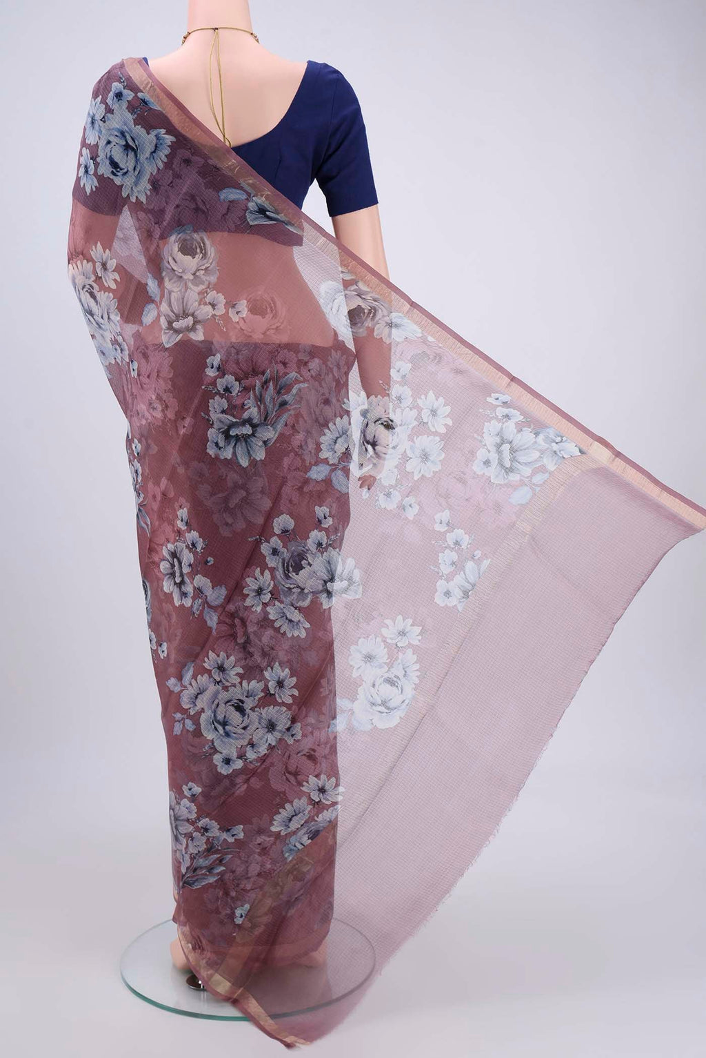 Flat view of Coral Kota Silk Saree with Printed design on the body and Zari Border. 