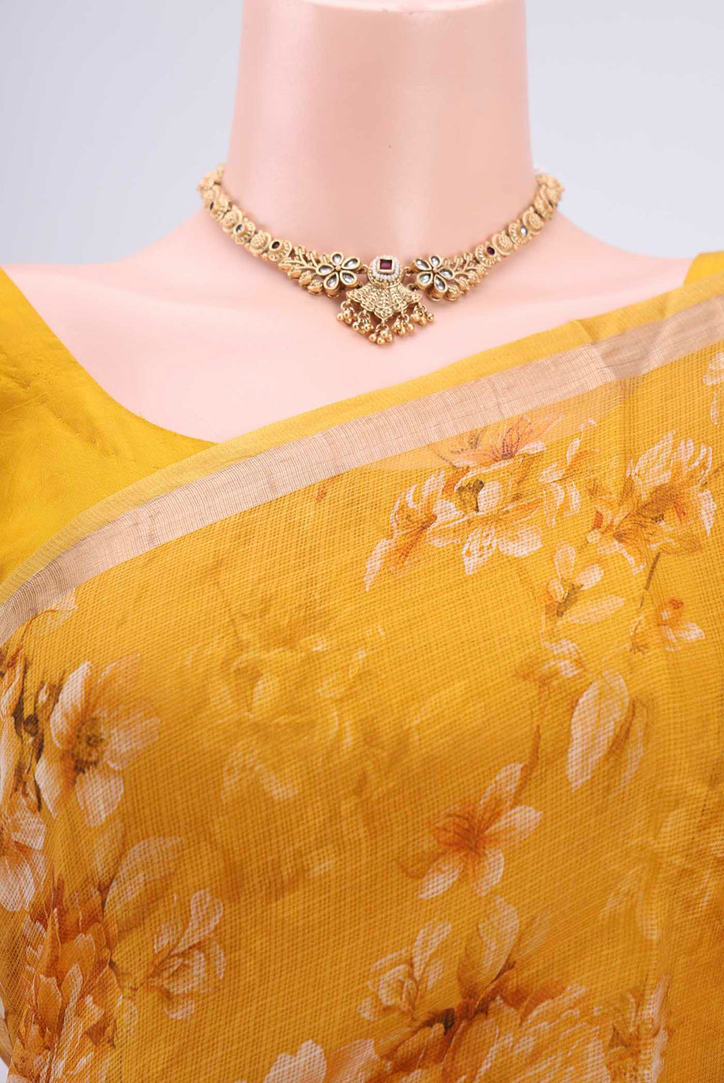 Border image of Mustard Kota Silk Saree with Printed design on the body and Zari Border. 