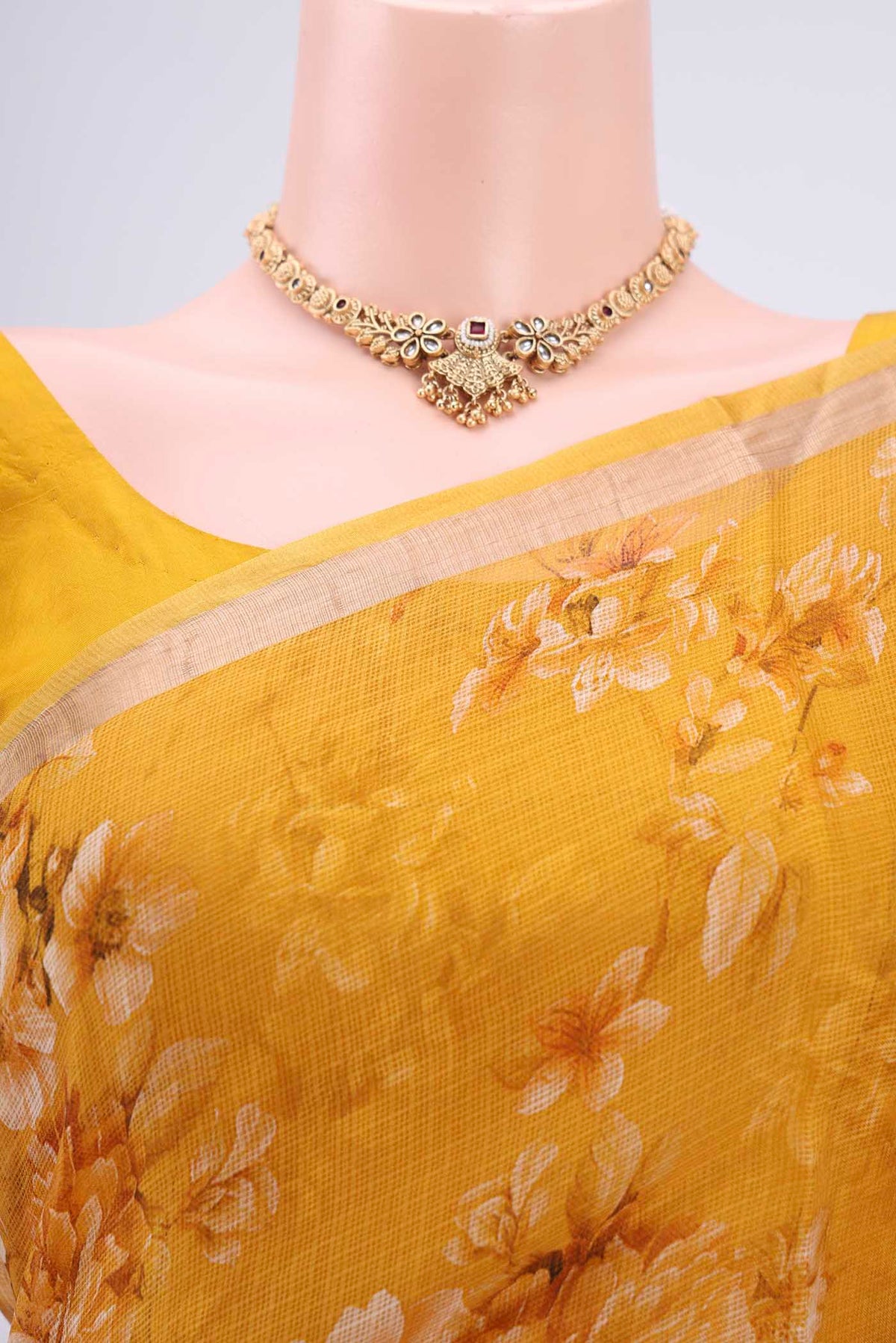 Border image of Mustard Kota Silk Saree with Printed design on the body and Zari Border. 
