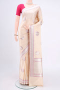 Cream Banarasi Silk Saree with Zari And Thread Butta on the body and Zari And Thread Border.  displayed on a mannequin