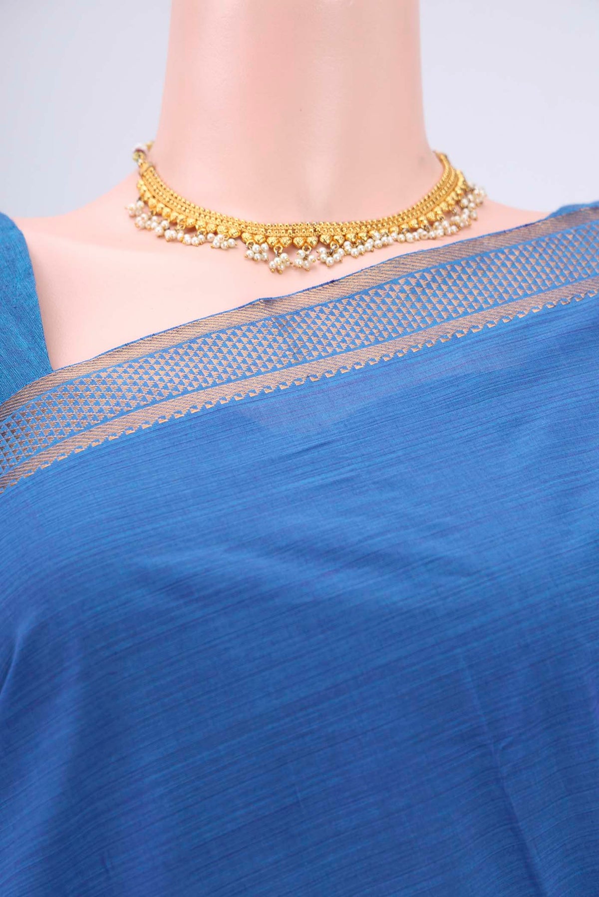 Border image of Blue Mangalagiri Cotton Saree with Plain Body and Zari Border. 