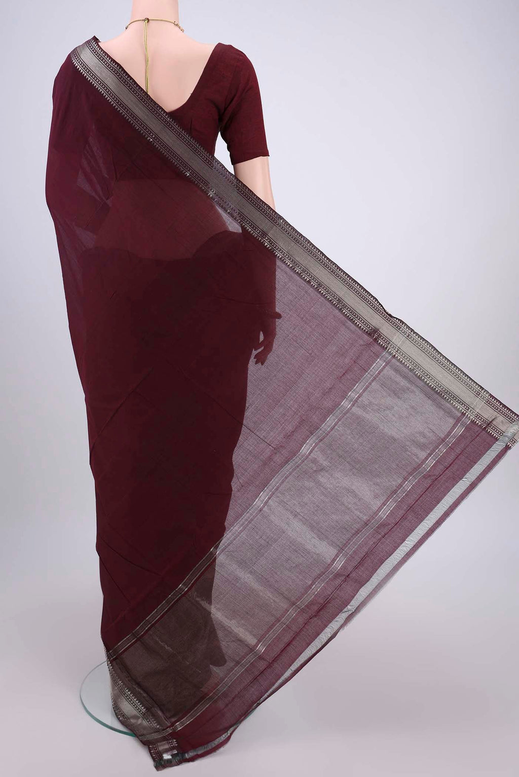 Flat view of Maroon Mangalagiri Cotton Saree with Plain Body and Zari Border. 