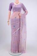 Lavender Organza Silk Saree with Printed design on the body and Zari Border.  displayed on a mannequin