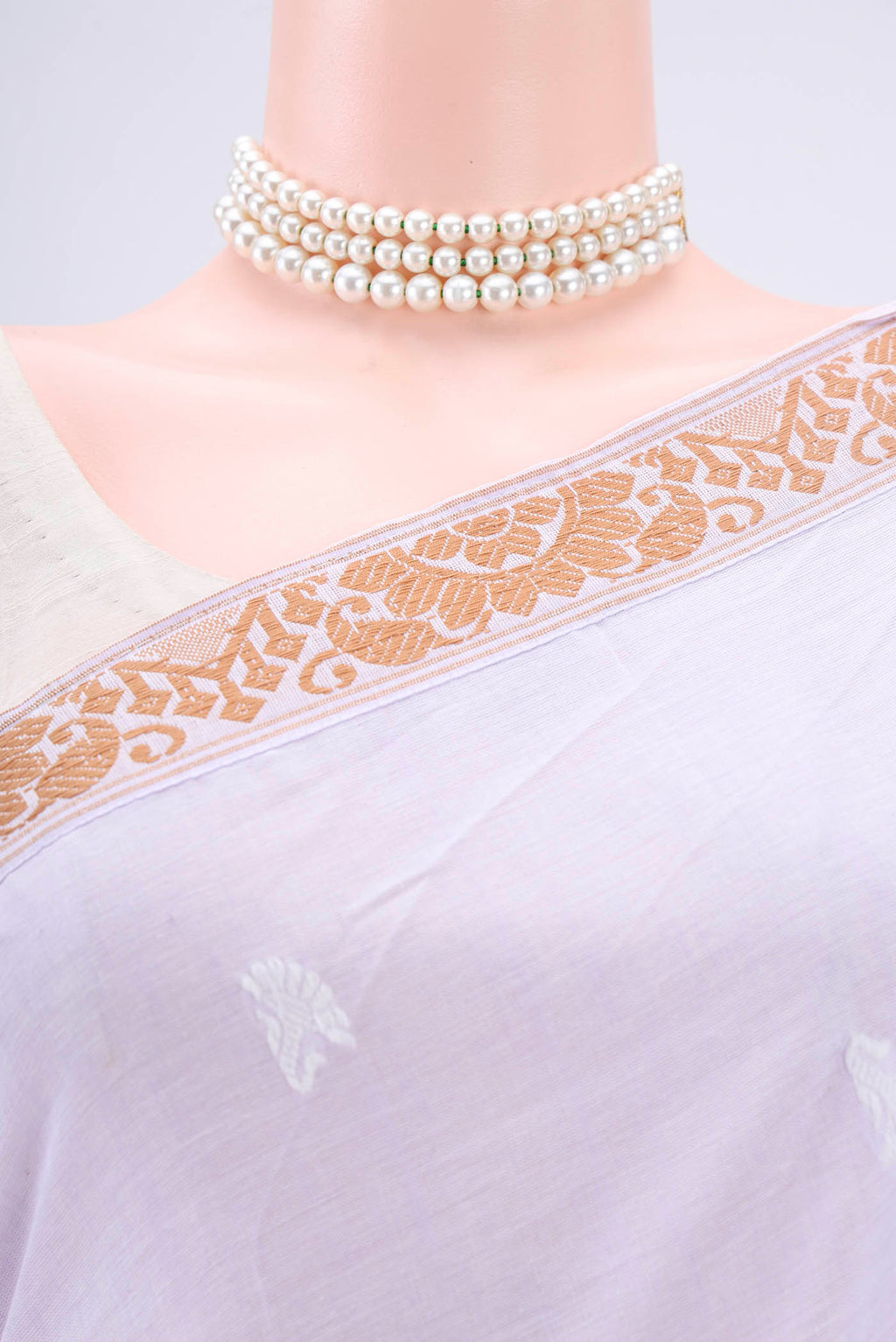 Border image of Purple Assam Cotton Saree with Thread Butta on the body and Plain Border. 