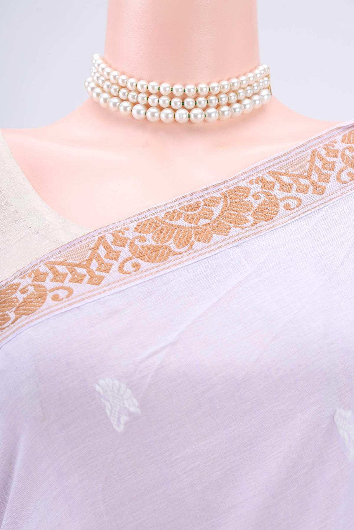 Border image of Purple Assam Cotton Saree with Thread Butta on the body and Plain Border. 