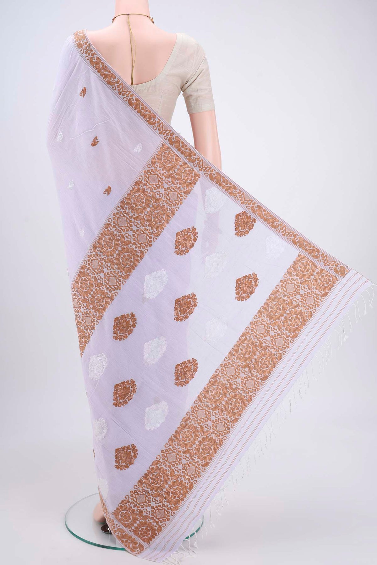 Flat view of Purple Assam Cotton Saree with Thread Butta on the body and Plain Border. 