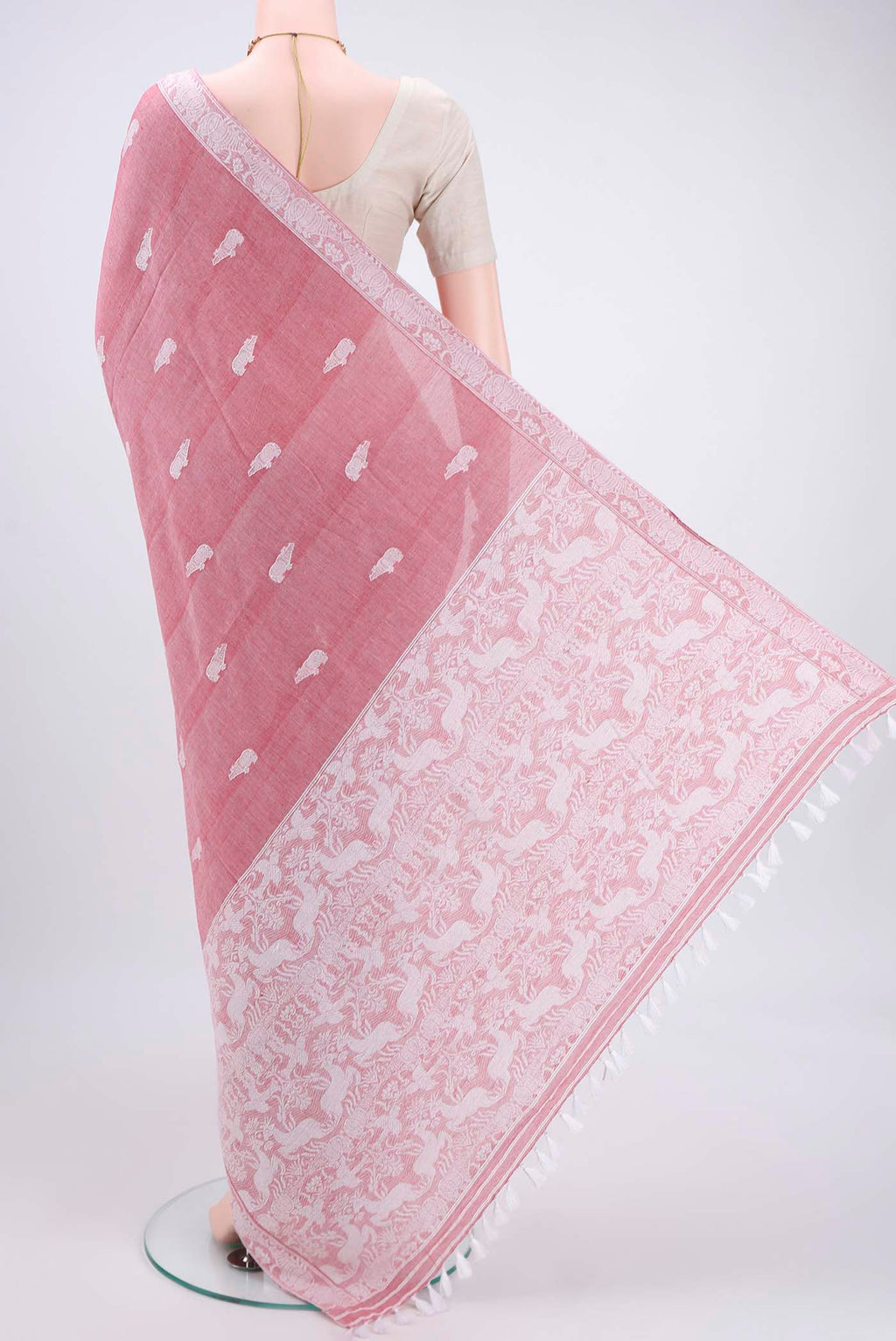 Flat view of Pink Assam Cotton Saree with Thread Butta on the body and Plain Border. 