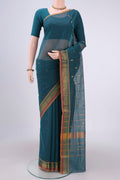 Peacock Blue Cotton Saree with Zari Butta on the body and Zari Border.  displayed on a mannequin