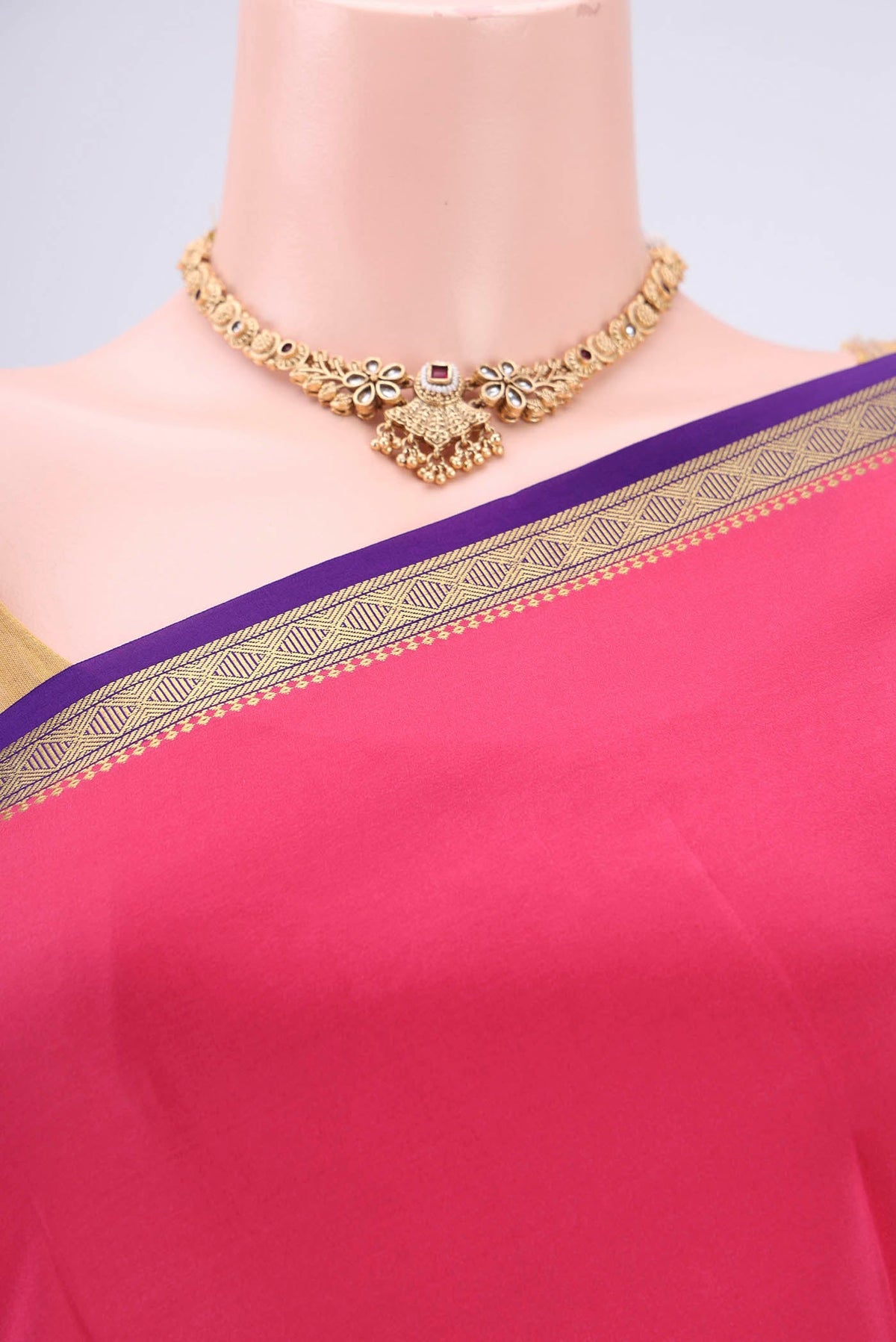 Border image of Pure Silk Pure Zari Dark Pink Mysore Crepe Saree with Plain Body and Zari Border. 