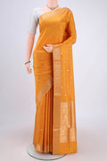 Yellow Soft Silk Saree with Zari Butta on the body and Zari Border.  displayed on a mannequin