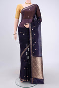 Purple Organza Silk Saree with Plain Body and Zari Border.  displayed on a mannequin