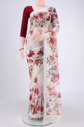 Off White Linen Saree with Floral Print on the body and Zari Border.  displayed on a mannequin