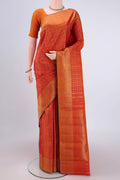 Pure Silk Pure Zari Rust Kanjivaram Saree with Checked design on the body and Zari Border.  displayed on a mannequin