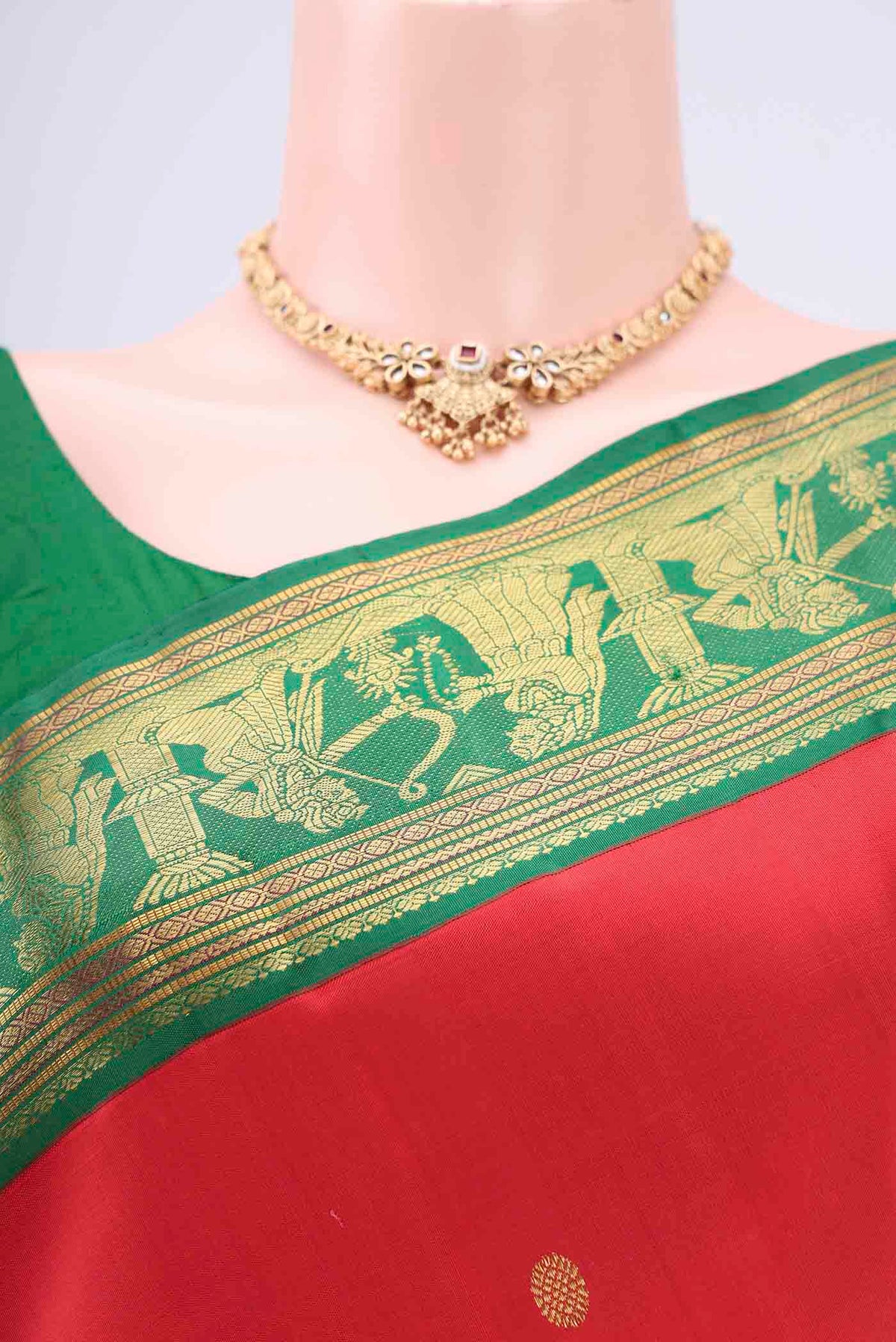 Border image of Red Dual Tone Kanjivaram Silk Saree with Zari Butta on the body and Zari Border. 