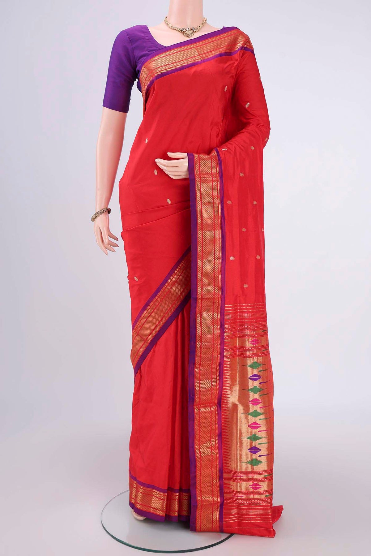 Red Paithani Silk Saree with Zari Butta on the body and Zari Border.  displayed on a mannequin