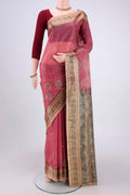 Rose pink Banarasi Tussar Silk Saree with Zari Butta on the body and Zari And Thread Border.  displayed on a mannequin