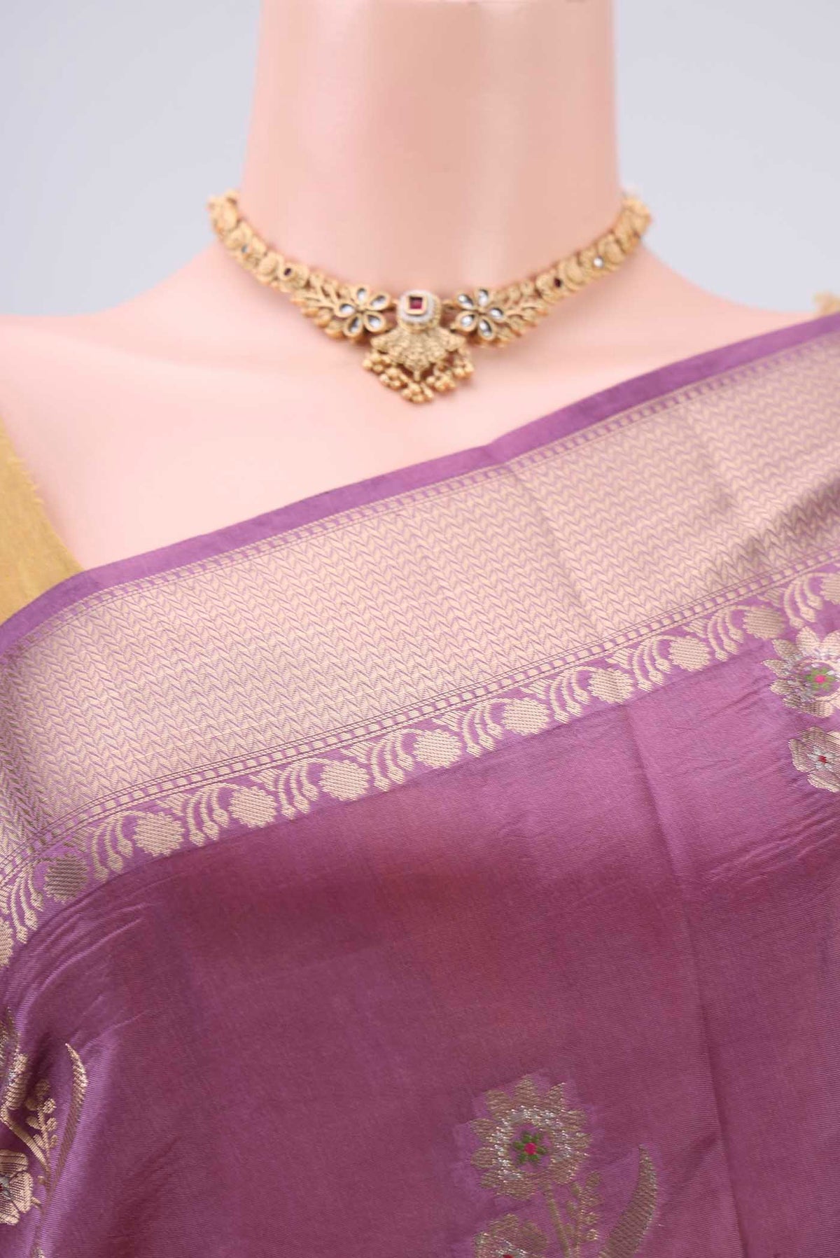 Border image of Mauve Banarasi Raw Silk Saree with Zari Butta on the body and Zari Border. 