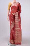 Rust Banarasi Raw Silk Saree with Zari Butta on the body and Zari Border.  displayed on a mannequin