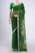 Green Uppada Cotton Saree with Zari And Thread Butta on the body and Thread Border.  displayed on a mannequin