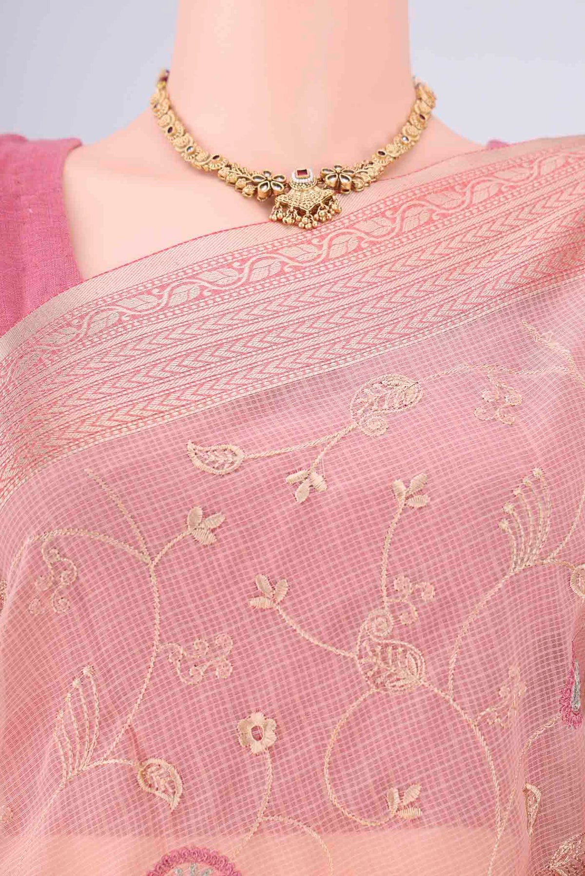 Border image of Peach Blended Kota Cotton Saree with Embroidery on the body and Zari Border. 