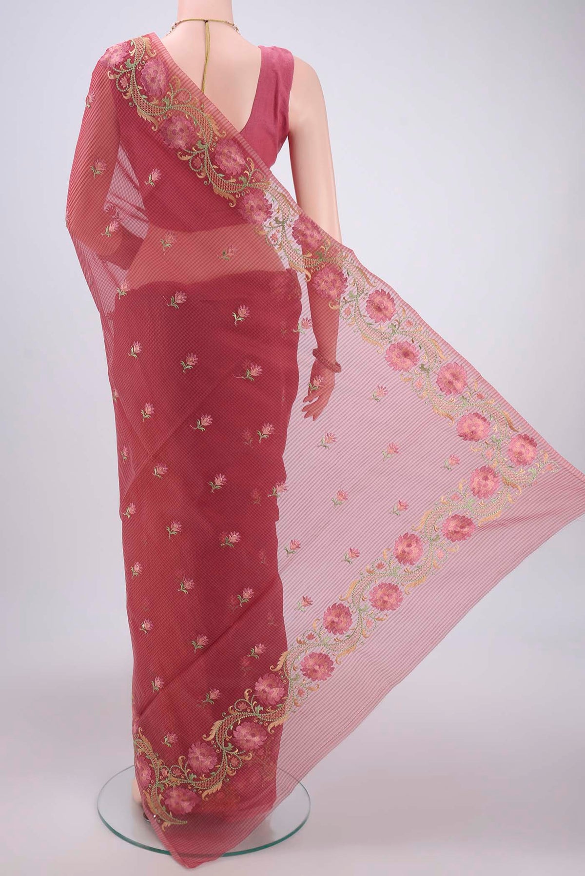 Flat view of Coral Kota Cotton Saree with Embroidery on the body and Thread Border. 
