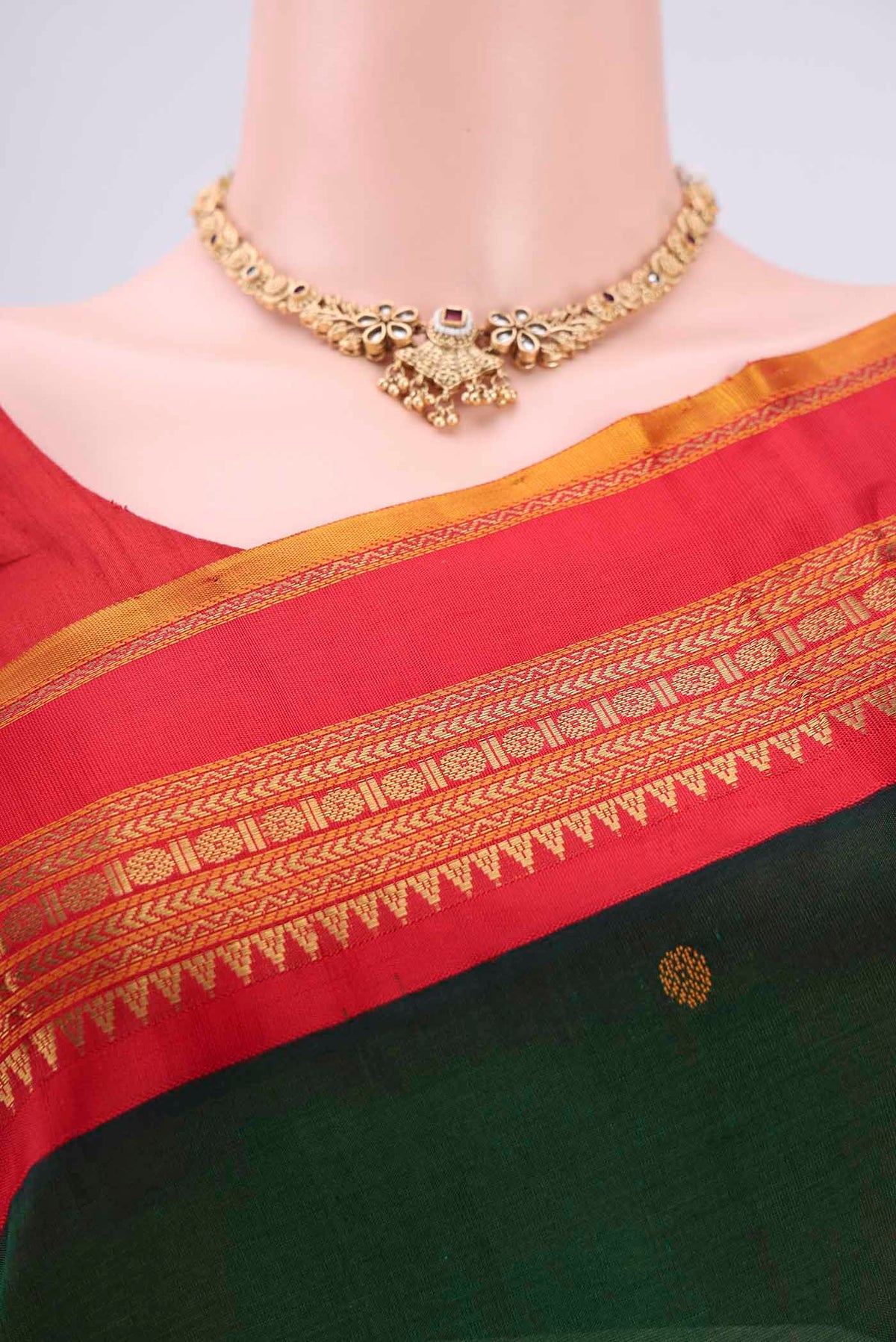 Border image of Red Coimbatore Silk Cotton Saree with Stripes on the body and Plain Border. 