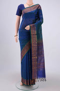 Turquoise Coimbatore Silk Cotton Saree with Stripes on the body and Plain Border.  displayed on a mannequin