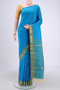 Blue Kanchipuram Silk Saree with Zari Butta on the body and One Side Border.  displayed on a mannequin