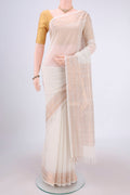 Off White Kanchi Cotton Saree with Plain Body and Zari Border.  displayed on a mannequin