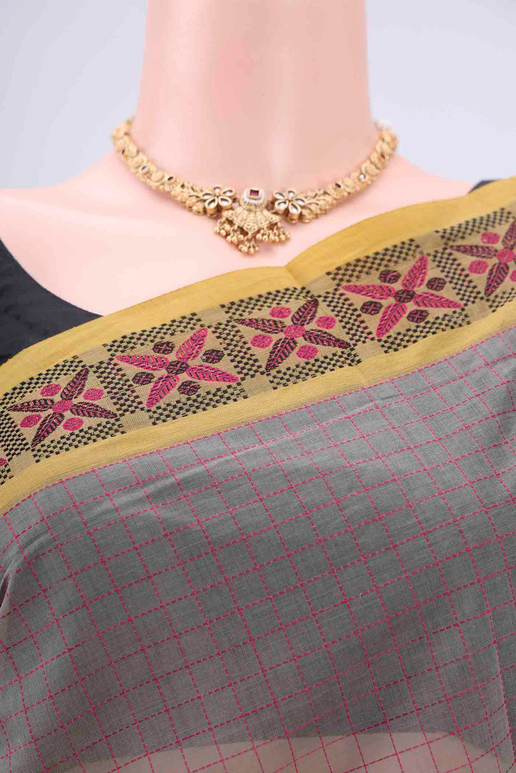 Border image of Grey Coimbatore Cotton Saree with Stripes on the body and Thread Border. 