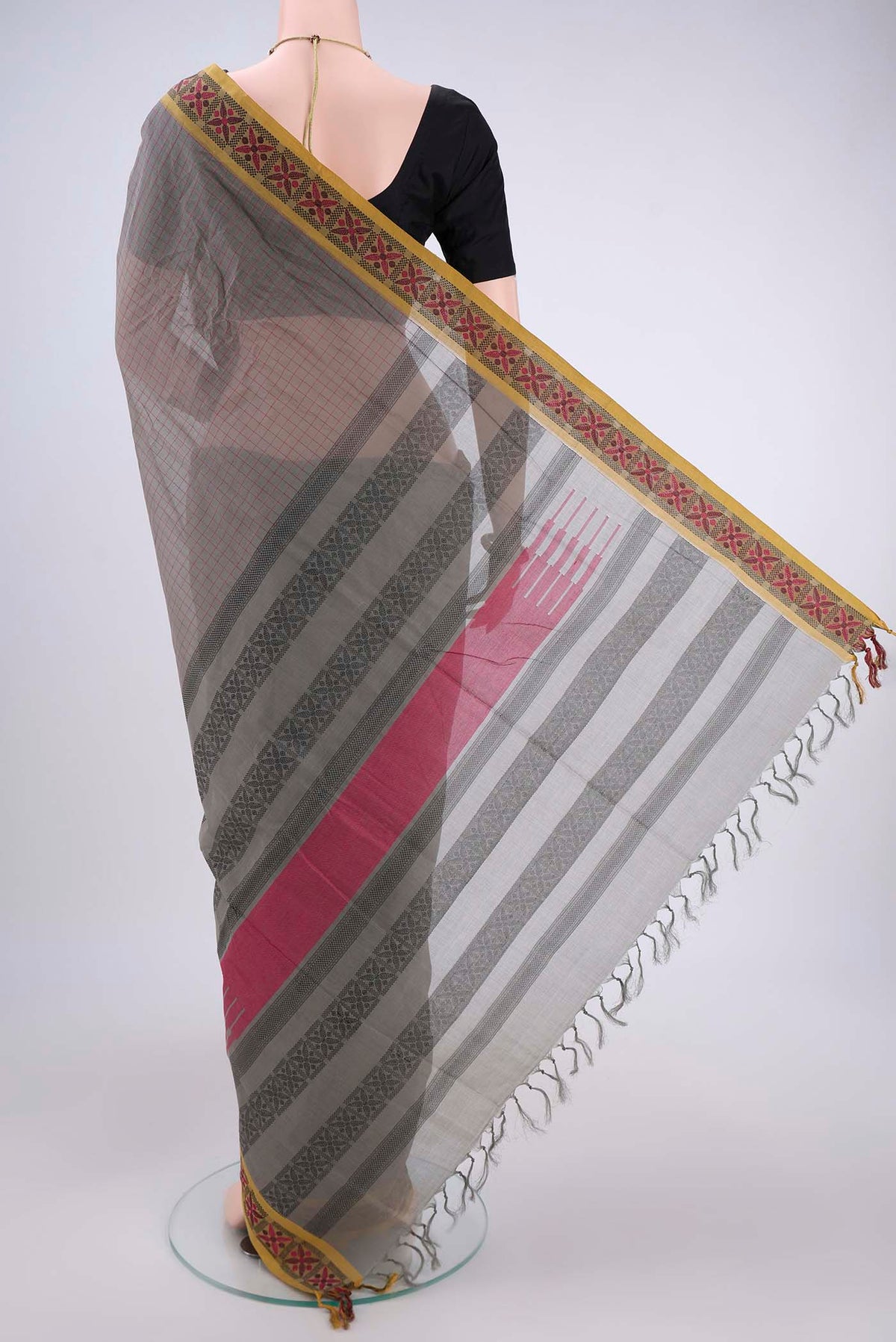 Flat view of Grey Coimbatore Cotton Saree with Stripes on the body and Thread Border. 