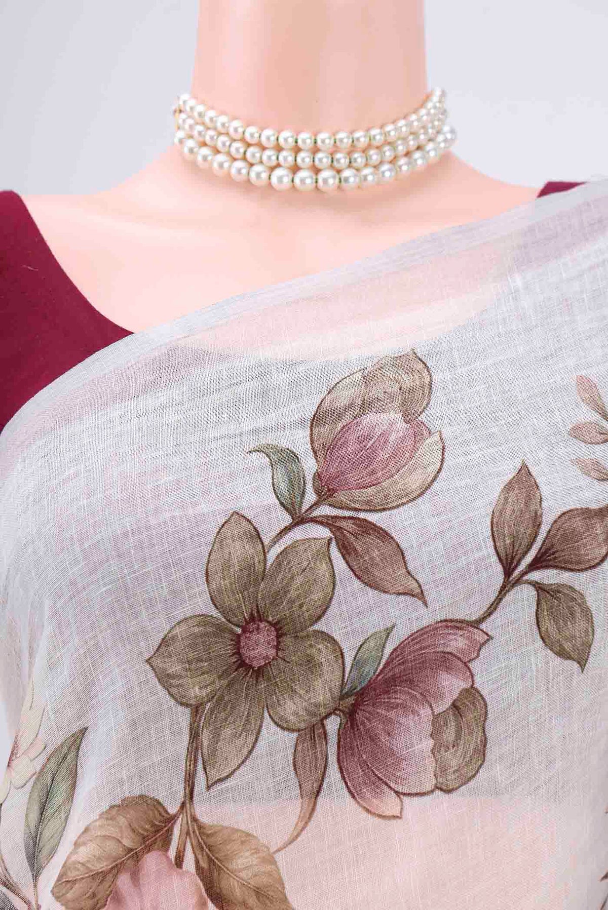 Border image of Off White Linen Saree with Floral Print on the body and Zari Border. 