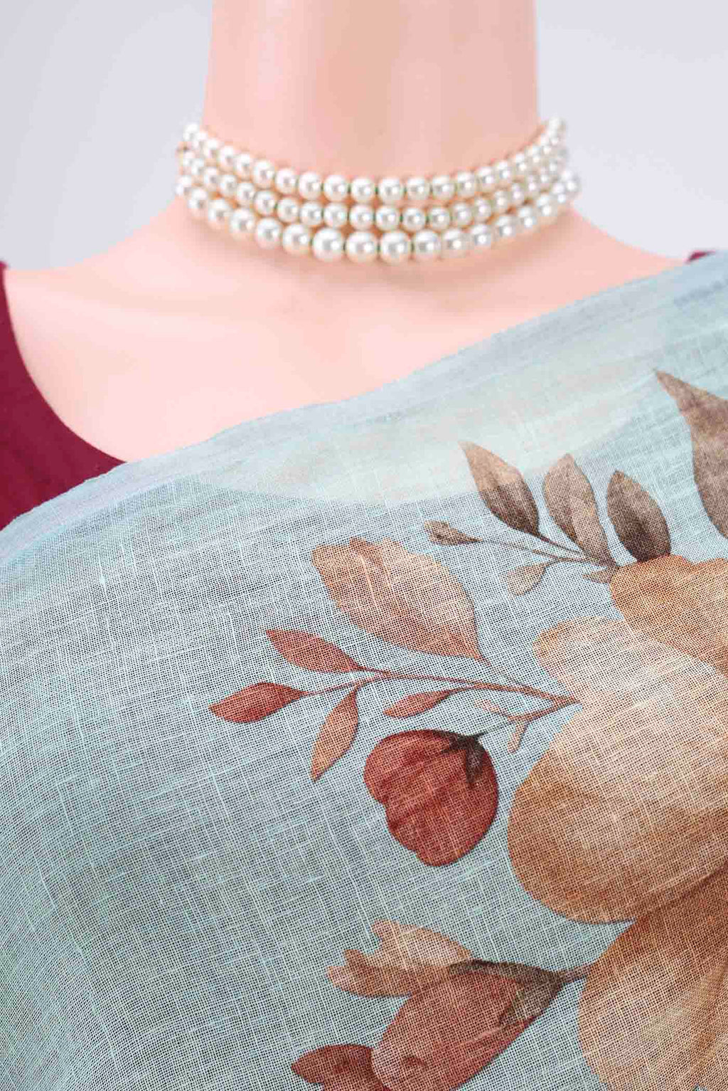 Border image of Sea Green Linen Saree with Floral Print on the body and Zari Border. 