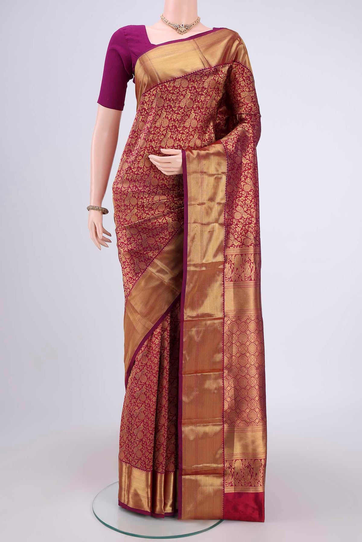 Magenta Bangalore Silk Saree with Zari Brocade on the body and Zari Border.  displayed on a mannequin