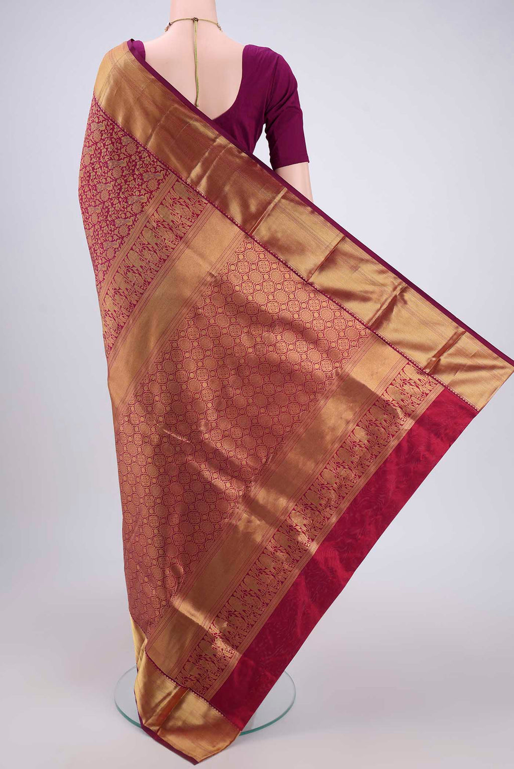 Flat view of Magenta Bangalore Silk Saree with Zari Brocade on the body and Zari Border. 